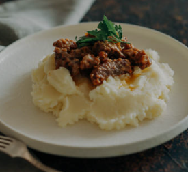 Ground Beef and Gravy Over Creamy Mashed Potatoes: A Comfort Food Classic